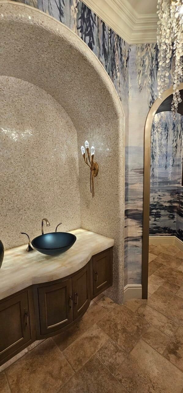 Elegant bathroom with custom tile work and modern fixtures.