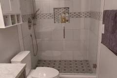 Elegant bathroom with walk-in shower, white tiles, and stylish mosaic details.