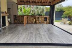 Beautifully installed gray tile flooring in a contemporary home interior, showcasing professional craftsmanship.