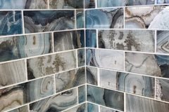 Quality blue marble tiles installed by Grapme Tile Works for a stylish, modern look. Perfect for enhancing any space with natural stone beauty.